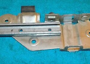 1980-1982 Granada Fairmont Monarch Zephyr 2-Dr NOS LH DOOR WINDOW GLASS BRACKET