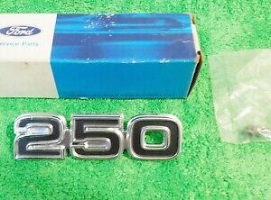 1975-1986 Ford E250 Econoline Van NOS '250' FENDER EMBLEM NAME PLATE