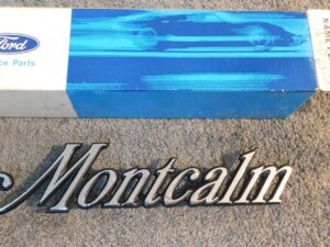 1973 1974 1975 Mercury Montcalm NOS 'MONTCALM' FRONT FENDER EMBLEM NAME PLATE