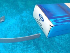1975 1976 Ford Custom 500 LTD Brougham Landau NOS PARKING LAMP DOOR LOWER TRIM