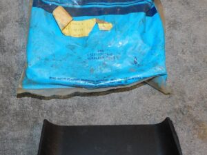 1983-1986 Ford Mustang LX GT Saleen Convertible NOS HEAD LAMP DOOR DIVIDER BAR