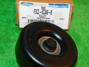 1990-1996 Ford Escort Mercury Tracer NOS NEW OEM 1.9L BELT TENSIONER PULLEY