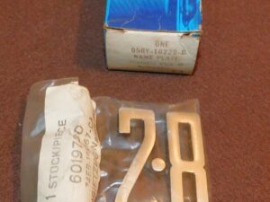 1975 1976 1977 Mercury Capri II NOS '2.8' V6 FRONT FENDER EMBLEM NAME PLATE