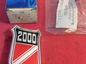 1973 1974 Ford Mercury Capri NOS '2000' FRONT FENDER EMBLEM NAME PLATE 2.0 Liter