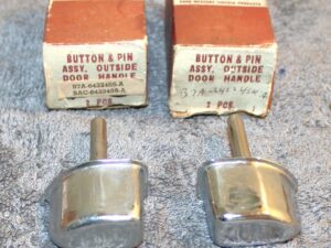 1957 1958 Ford Custom Fairlane 500 Galaxie NOS LH+RH DOOR OUTSIDE HANDLE BUTTONS