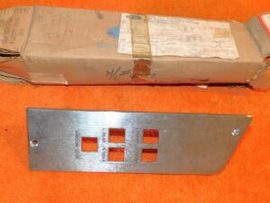 1976-1979 Granada Ghia Monarch Versailles NOS LH FRONT DOOR SWITCH BEZEL HOUSING