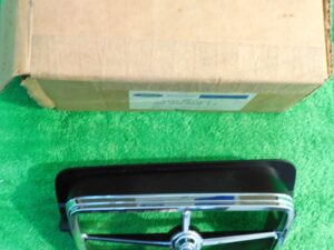 1975 Mercury Comet Gt NOS RH FRONT GRILLE PARKING LAMP DOOR BEZEL